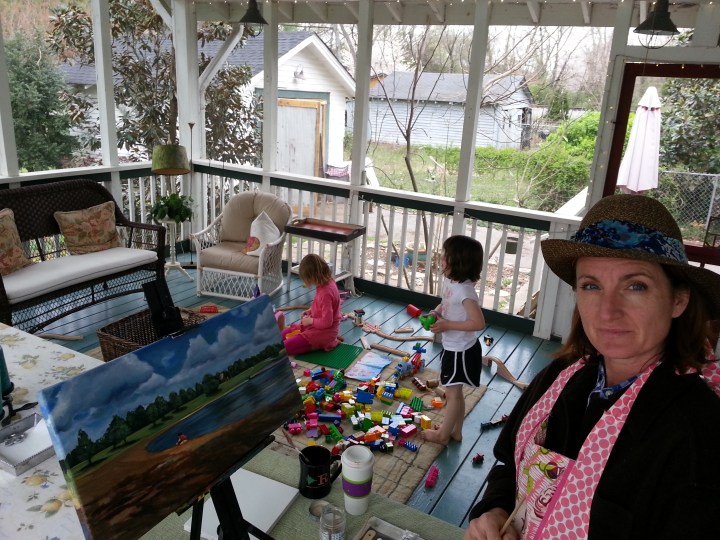 the Block Mom painting while entertaining all the kids.